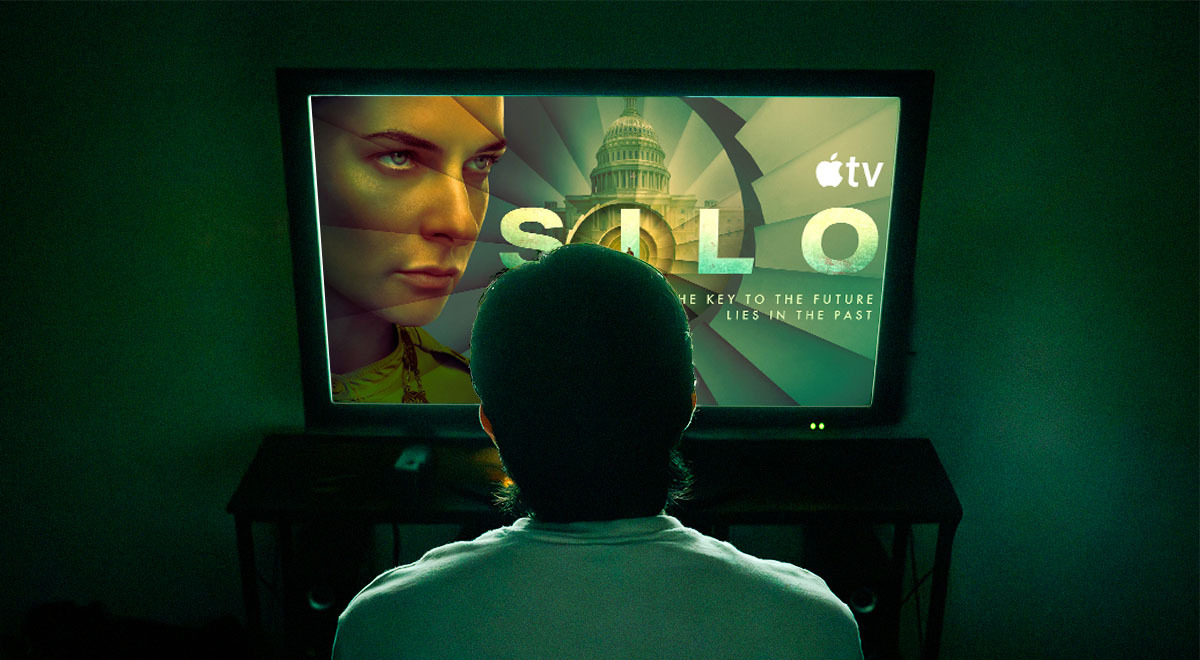 person watching silo on tv