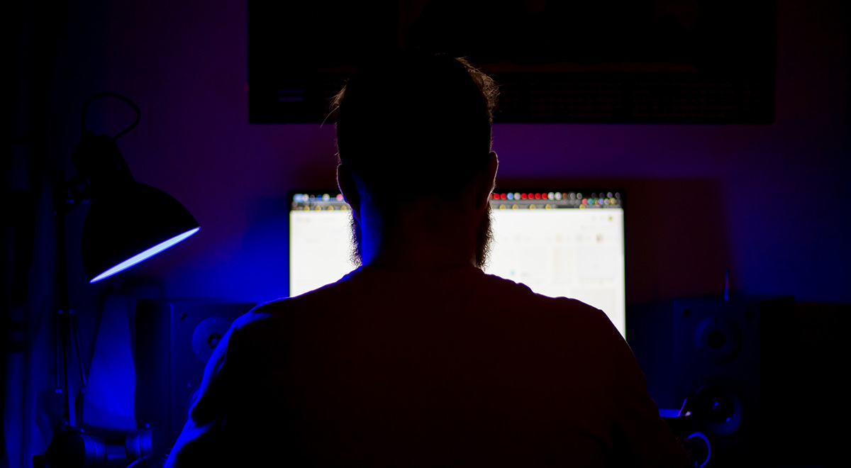 sketchy looking man computer