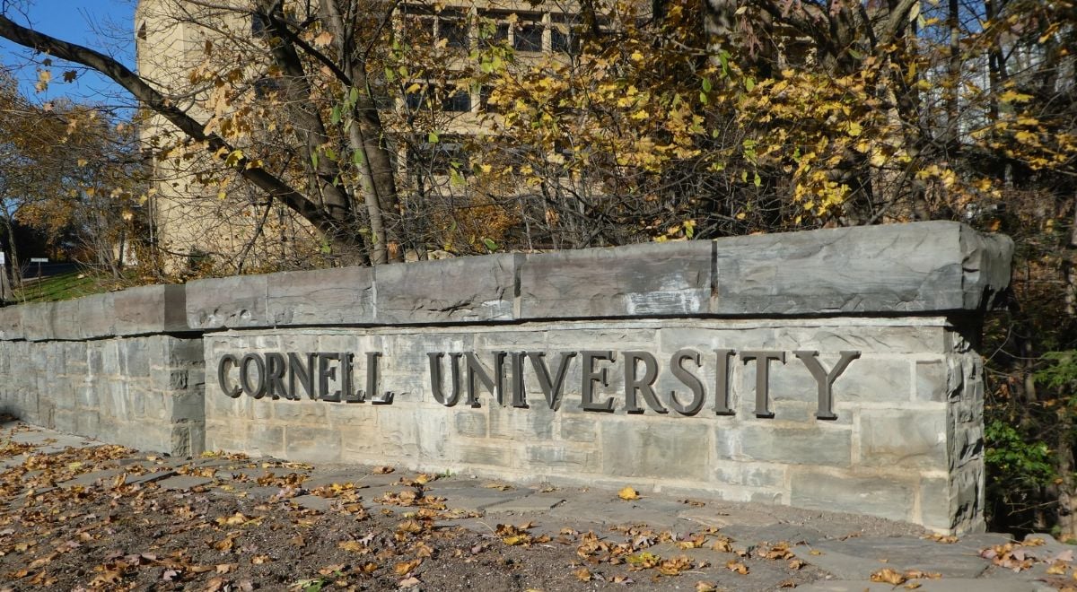 Cornell University entrance sign, with leaves in fall