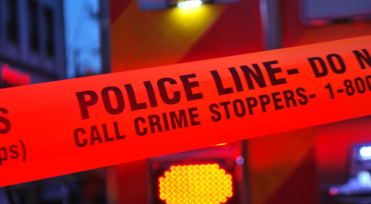 Crime Stoppers written on red police tape