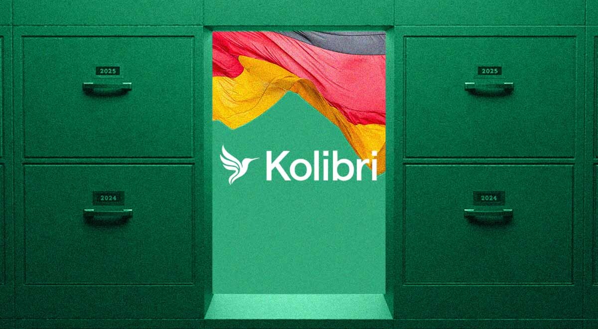 The logo of Kolibri and German flag between 2 green cabinets with drawers