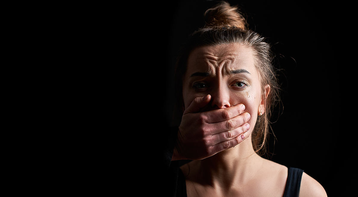 Portrait of stressed unhappy crying woman victim in fear