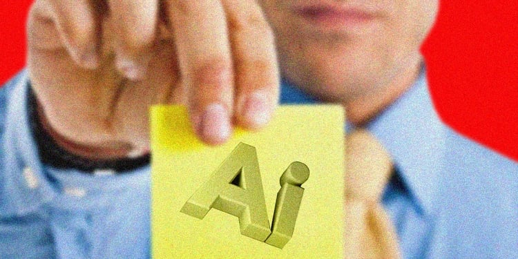 An office worker holds a sticky note that says AI