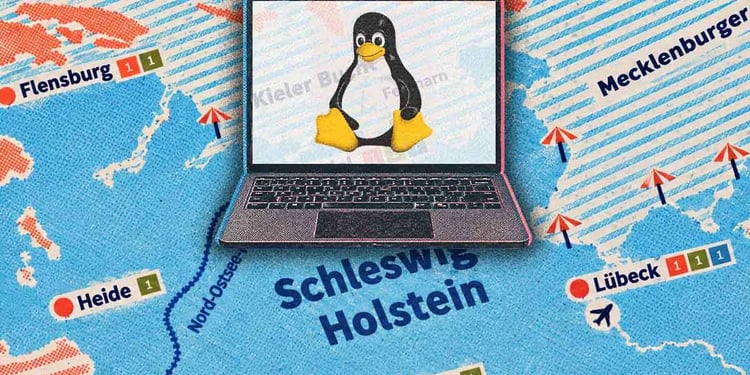 A laptop with Linux logo, a map of Schleswig-Holstein