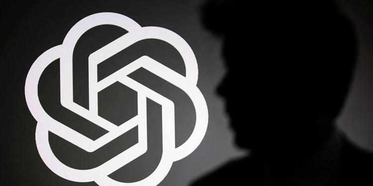 The silhouette of Sam Altman and OpenAI logo