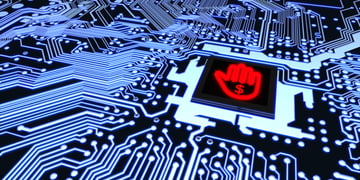 Blue circuit board closeup connected to a cpu with a glowing stop hand symbol