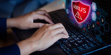 laptop with antivirus program icon
