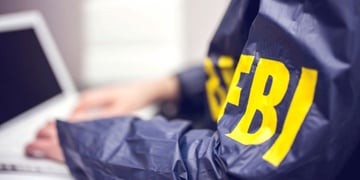fbi agent using a laptop