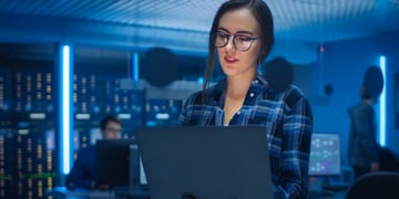 Women using computer in the server room