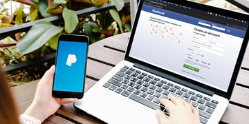 female using a laptop and smartphone