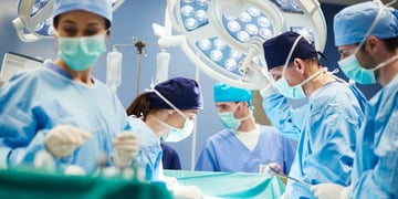 Group of surgeons in operating room