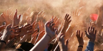 Crowded people hands up