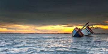 Sinking boat in the ocean