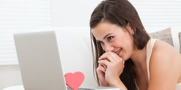 woman staring at a screen