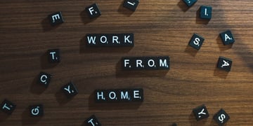 text "work from home" formed from Scrabble letters
