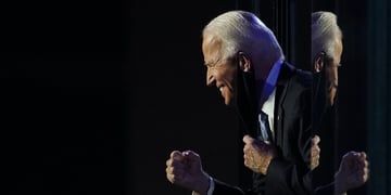 Democratic 2020 U.S. presidential nominee Joe Biden celebrates onstage at his election rally, after 