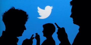 people with phones, twitter logo