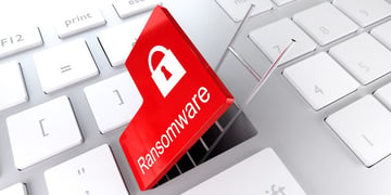 Opened red ransomware button on laptop with ladder going out