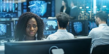 Female Computer Engineer Works on a Neural Network