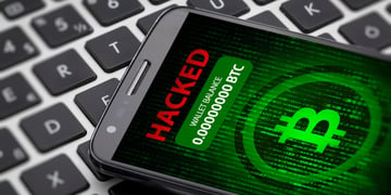 Bitcoin wallet hacked message on smart phone screen