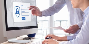 Cyber security concept with manager providing authentication credentials (login, password) to employ