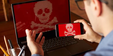 16-bit skull taking picture from mobile phone