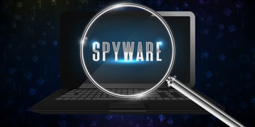 Magnifying glass by the computer detecting spyware