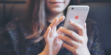woman holding iphone
