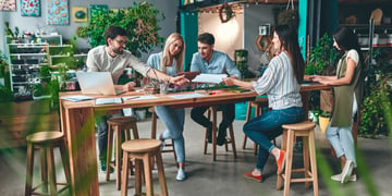 Group of young business people are working together in modern office