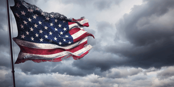 Symbolic depiction of ragged US flag to show country taking a pounding from cyber attacks
