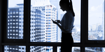 Female executive on phone in office