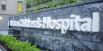 Signage on hospital wall