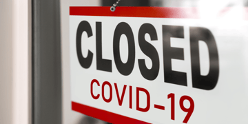 Shop sign saying closed COVID-19