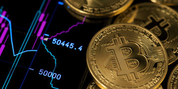 Concept picture of cryptocurrency coins scattered across a trading screen.