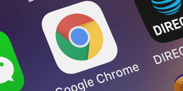 Close-up of Google Chrome browser logo on cellphone.
