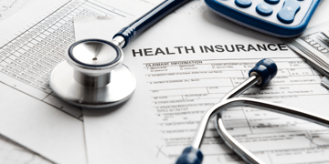 Medicare form with doctor equipment and a mobile phone