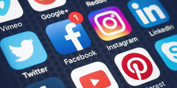 Showing social media icons on smartphone.