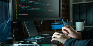 hacker in front of a computer