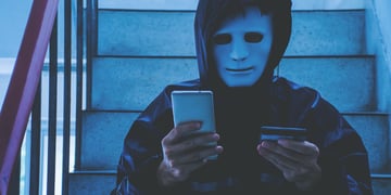Cybercriminal with a mask