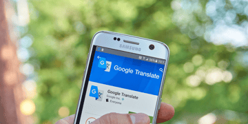 Google Translate on cellphone held in hand