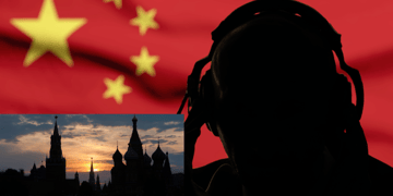 Chinese flag and silhouetted wiretap spy in background with Kremlin skyline in foreground