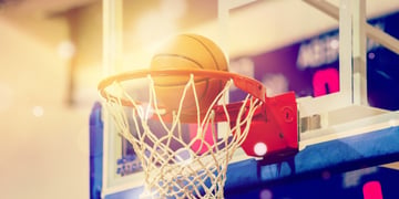 Orange basketball in the hoop