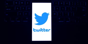Twitter logo laptop keyboard