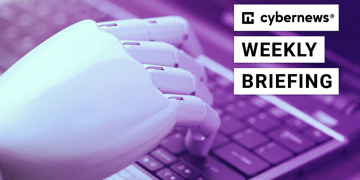 Robotic hand on a keyboard