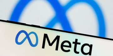 Meta Platforms Inc's logo is seen on a smartphone