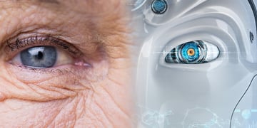 an eye of an elderly person and an eye of a robot