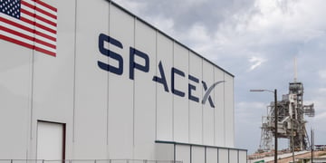 Space X building w logo and American Flag