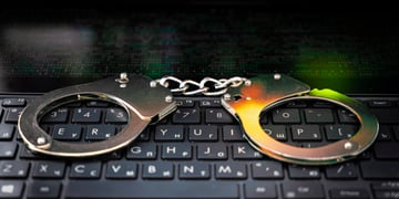 Handcuffs on keyboard