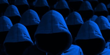 Lots of faceless hackers in hoodies