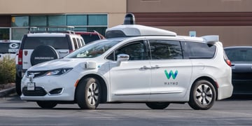 Alphabet Waymo on street